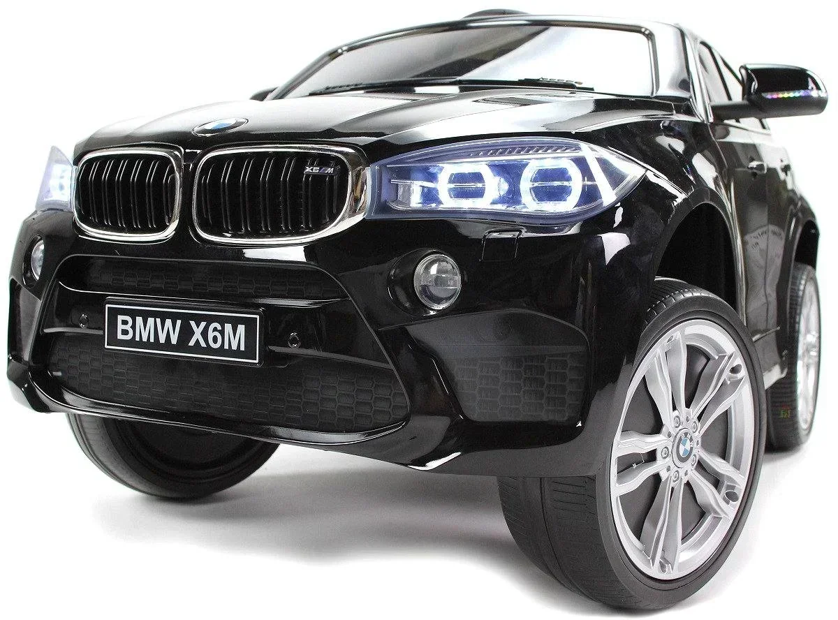 Carro eléctrico recargable para niños BMW con luces en las llantas de 1 a 6 años 4
