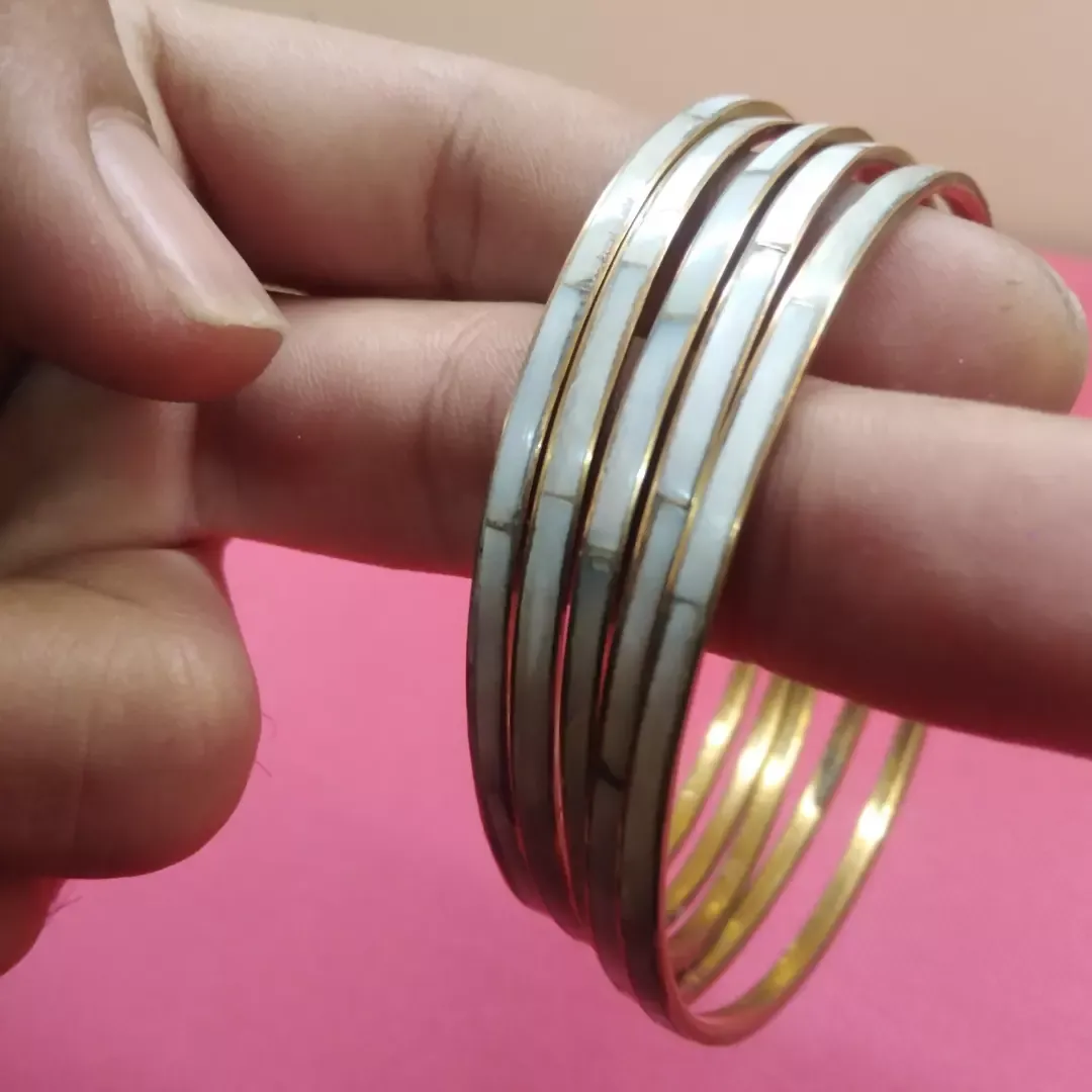 pulseras de bronce y concha nácar