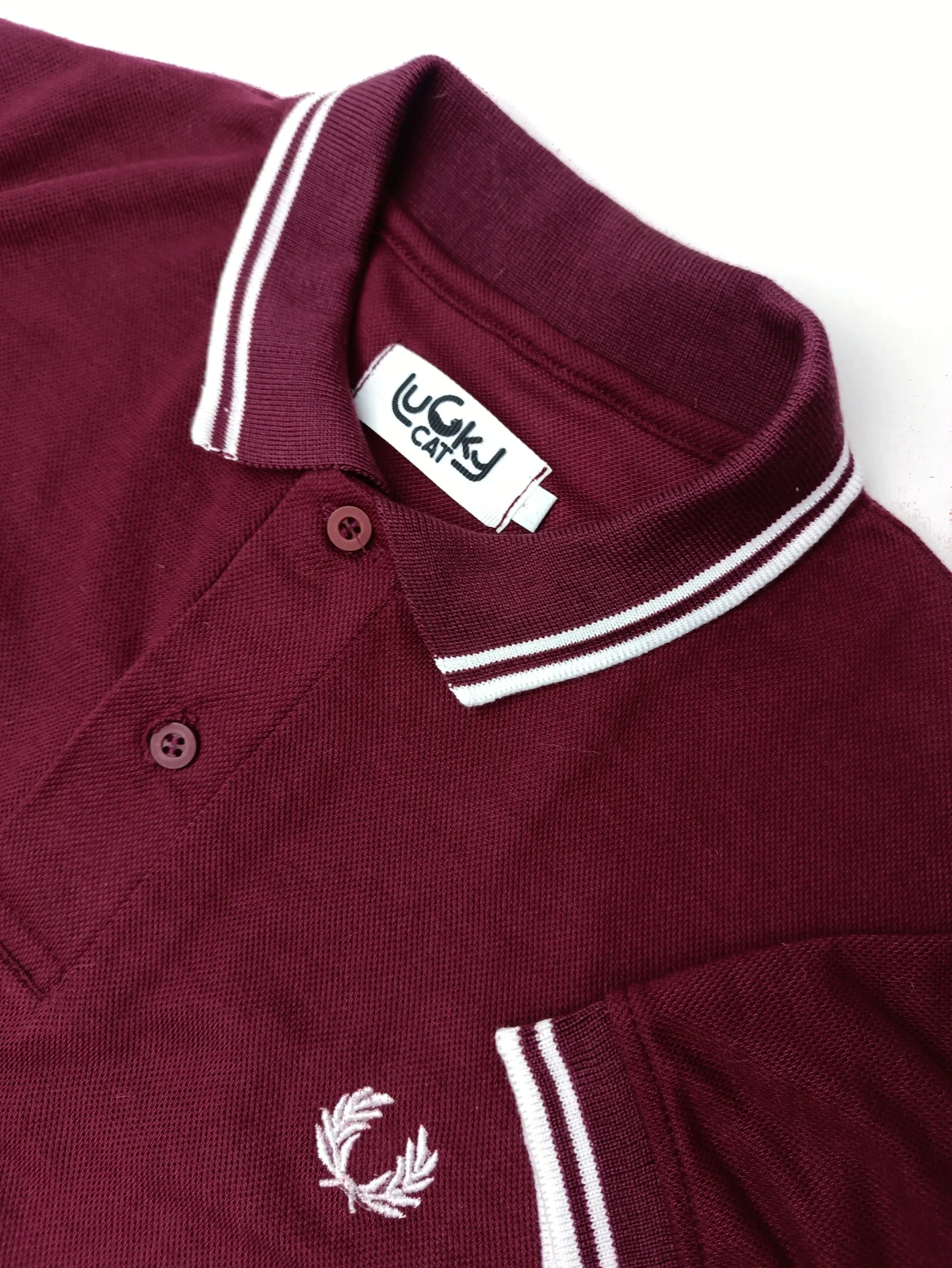 Camisa polo vinotinto talla L 