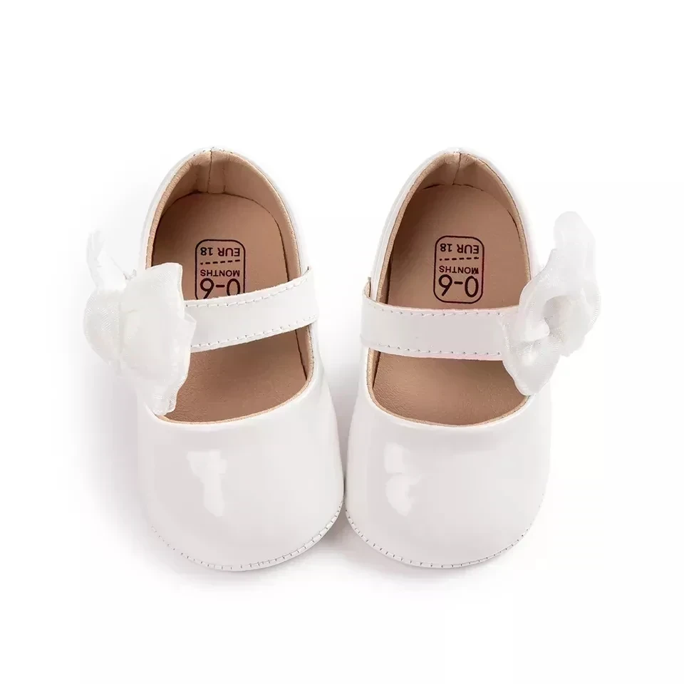 ZAPATITOS BLANCOS LAZOS  2