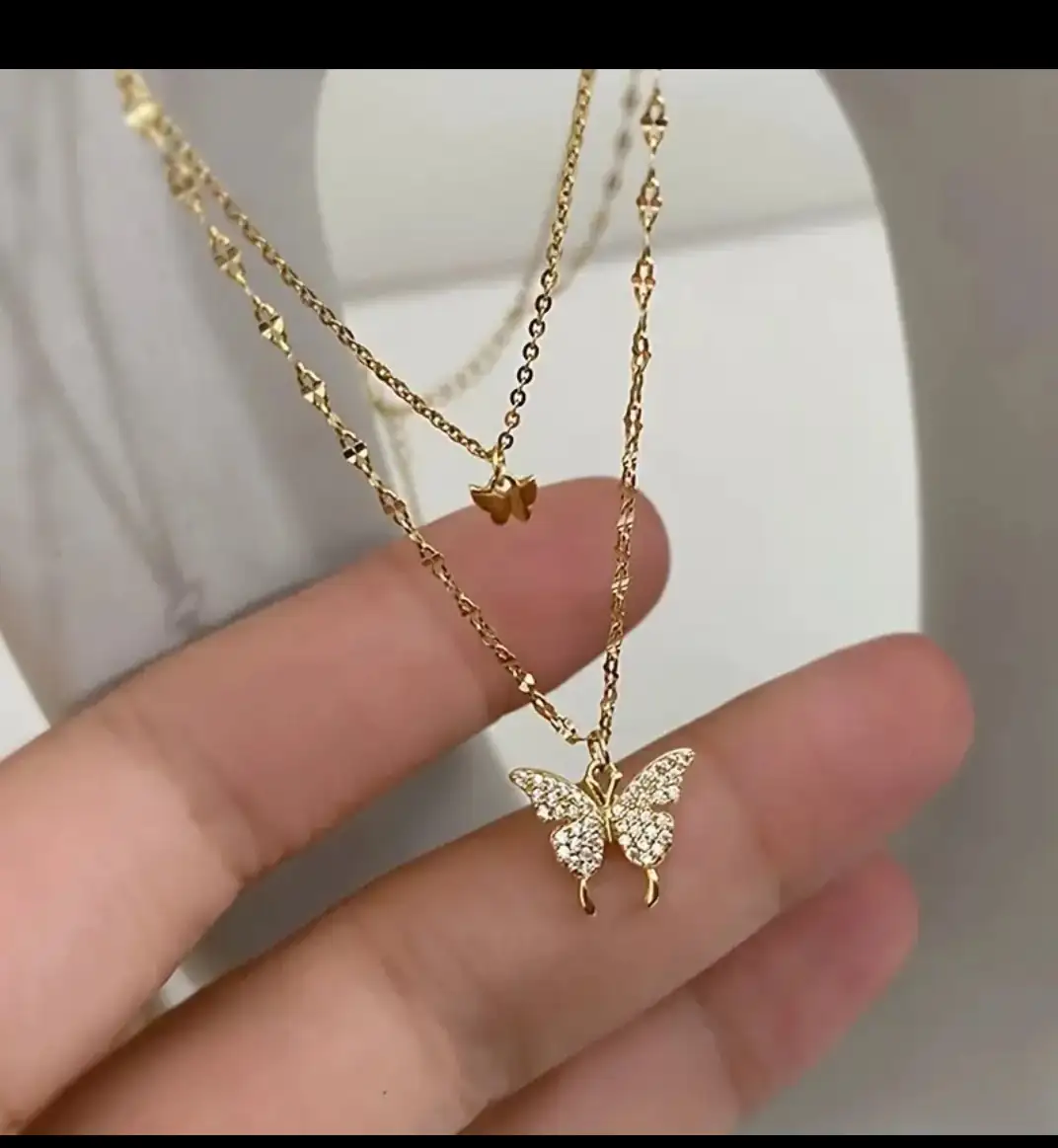 Cadenita doble con dijes se mariposa