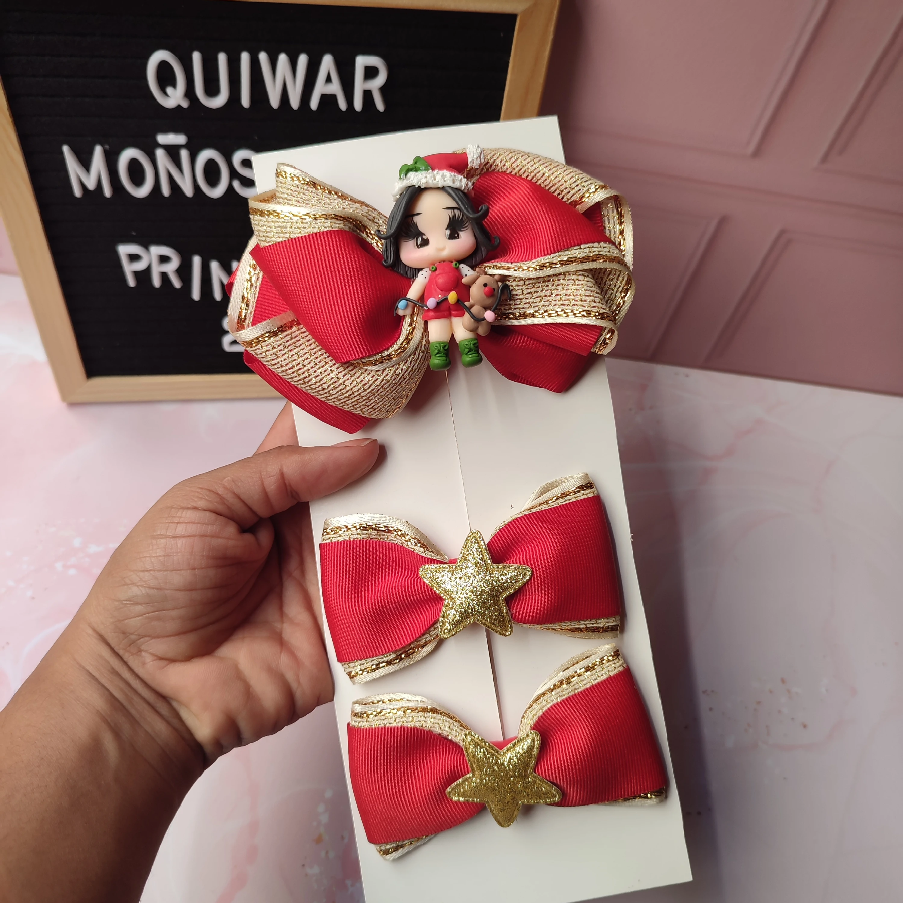 Lazo rojo con dorado navidad centro muñeca con luces y pares dorados centro estrella