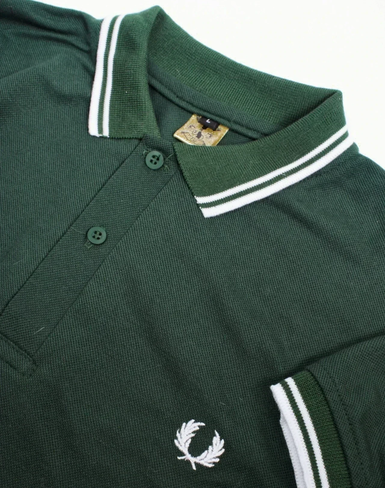 Camisa polo verde botella 