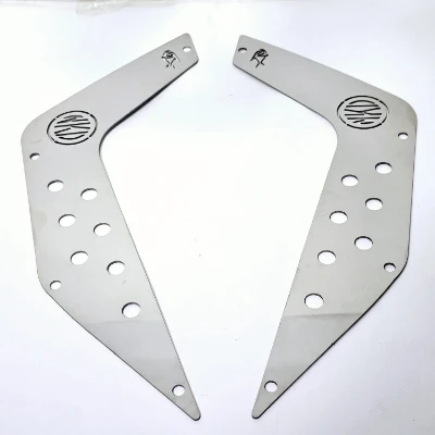 NKD 125 Protector de tapas laterales acero cromado ML