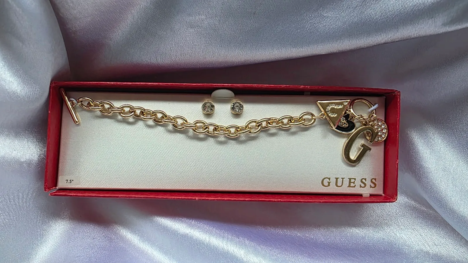 Guess- Pulsera + aros tono gold disponible  2