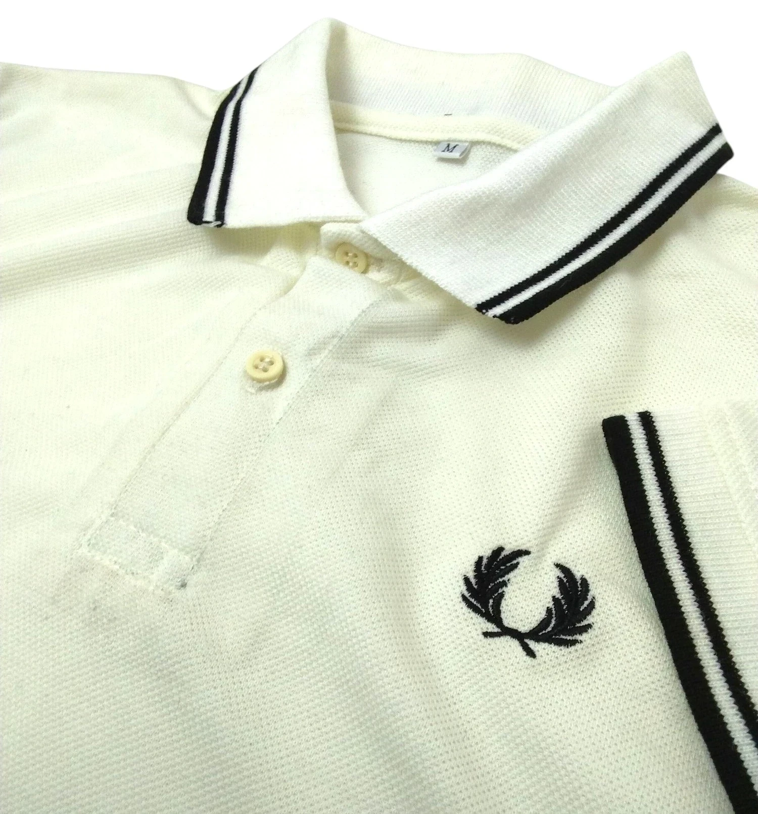Camisa polo crema con negro  2