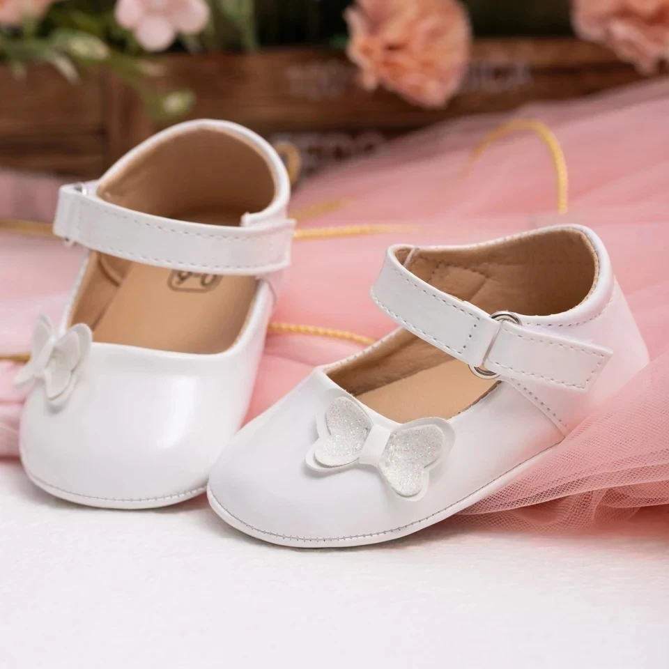 ZAPATITOS BLANCOS MARIPOSA 